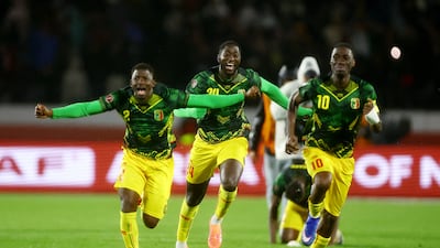 Mali players celebrate after winning the penalty shoot-out. Reuters