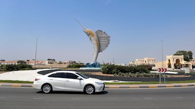A sailfish artwork leaps from the centre of this roundabout in Umm Al Quwain.