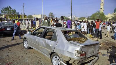 A damaged car at the scene of multiple bombings at Kano Central Mosque on November 28, 2014. Reuters