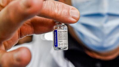 A vial of Russia's Sputnik V vaccine for Covid-19 is shown before being administered for the first time to people at a clinic in the city of Blida in Algeria. AFP