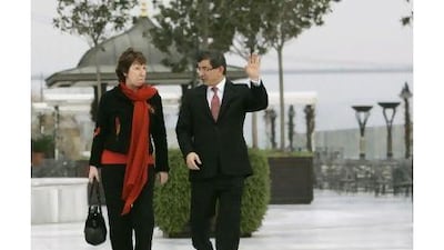 The EU's foreign policy chief, Catherine Ashton, left, and Turkey's foreign minister, Ahmet Davutoglu, arrive for a meeting in Istanbul, for talks before the meeting between Iran and world powers in Istanbul.