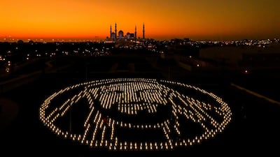 The Year of Zayed icon is lit up by solar lanterns in Abu Dhabi. The Zayed Future Energy Prize achieved a Guinness world record for the largest environmental sustainability lesson. Zayed Future Energy Prize