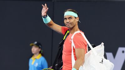 Rafael Nadal of Spain waves to the crowd in his doubles match against Australia's Max Purcell and Jordan Thompson during the Brisbane International tennis tournament in Brisbane, Australia, Sunday, Dec. 31, 2023. (AP Photo / Tertius Pickard)