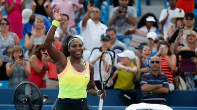 Serena Williams celebrates defeating Simona Halep in the WTA Cincinnati final on Sunday. Rob Carr / Getty Images / AFP / August 23, 2015