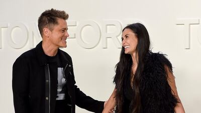 Rob Lowe and Demi Moore attend the Tom Ford show during New York Fashion Week on February 7, 2020, in Los Angeles. AP