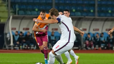England's Harry Kane scores his side's fifth goal from the penalty spot. Kane's four first-half goals took him to 48 international goals for England. AP Photo
