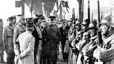 US Army General John J. Pershing, center, inspects French troops at Boulogne, France, on June 13, 1917.