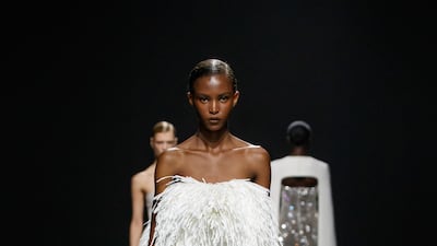 A tailored mini dress is framed with strips of leather at the Ashi Studio spring 2023 couture collection in Paris. Photo: Ashi Studio