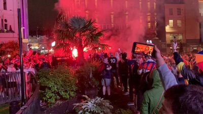 Flares lit up at Leicester Square as Scotland fans celebrate. Reuters