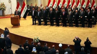 Iraqi Parliament Speaker Osama al Nujaifi addresses the parliament in Baghdad yesterday as lawmakers gave Prime Minister Nouri al Maliki's government a vote of confidence and adopted a 43-point programme aimed at liberalising the economy and fighting terrorism.