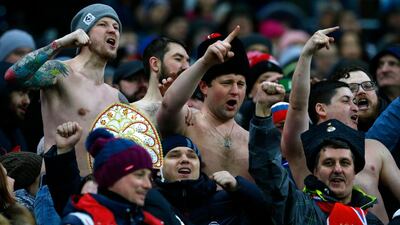In this Friday, March 23, 2018 file photo, Russia supporters gesture on the stands during an international friendly soccer match between Russia and Brazil at the Luzhniki stadium in Moscow, Russia. Racist chants have become more common in Russian soccer as the country prepares to host the World Cup. (AP Photo/Alexander Zemlianichenko, File)