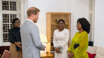 Prince Harry meets Angolan First Lady Ana Dias Lourenco at a reception at the British Ambassadors Residence in Luanda, Angola, on September 27, 2019. EPA