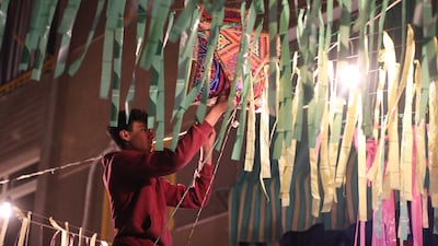 Putting up decorations and ornaments in Giza, Egypt, in preparation for Ramadan. EPA