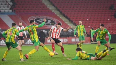 Billy Sharp (C) of Sheffield scores the 2-1 goal during the English Premier League soccer match between Sheffield United and West Bromwich Albion in Sheffield, Britain. EPA