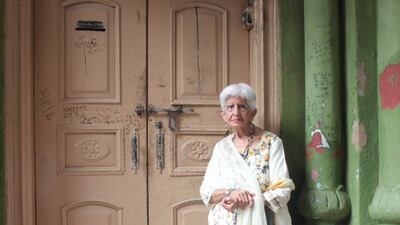 Ms Verma standing outside her ancestral home, now owned by Pakistani Muslims, in Rawalpindi in Pakistan. She lived in the house for 15 years before migrating to India in 1947.