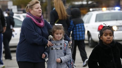 Buses were lined up outside the school when the accident happened around 2.45pm, Indianapolis Fire Department captain Rita Reith said. Mykal McEldowney / The Indianapolis Star via AP