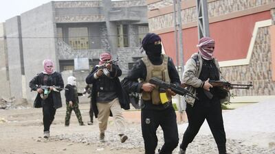 Tribal fighters who have been deployed onto the streets, patrol in the city of Fallujah, 50-kilometres west of Baghdad on January 5, 2014. Government officials in western Anbar province met tribal leaders to urge them to help repel Al Qaeda-linked militants who have taken over parts of Ramadi and Fallujah, strategic Iraqi cities on the Euphrates River. Reuters