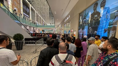 People queue for the iPhone 15 at Mall of the Emirates in Dubai. Antonie Robertson / The National