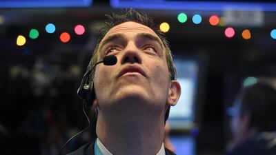 A trader on the floor of the New York Stock Exchange. The challenge for equity investors next year will be to achieve capital gains, while fixed income investors will struggle to preserve wealth. Photo: Reuters