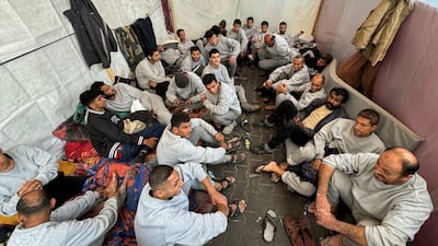 Palestinians detained by the Israeli army, who say they were mistreated, shelter in a school in Rafah, in December 2023. Reuters