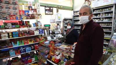 Shop owner Mudaver Uygur poses for a photo in his shop in the Turkish capital Ankara. AFP