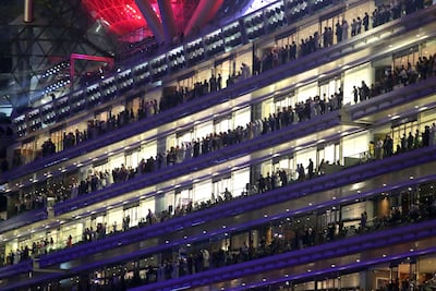Spectators enjoy races from the Meydan grandstand. Jaime Puebla / The National