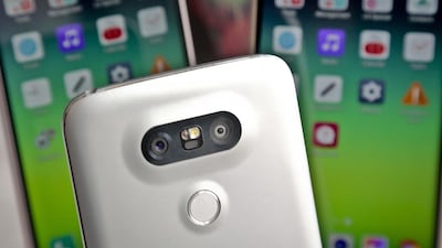 The rear camera and front screen of the LG G5. Bebeto Matthews / AP Photo