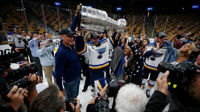 The Stanley Cup, given to the winners of the North American ice hockey league champions, has to be one of the biggest trophies across sport. Hockey players are known to be a tough lot, and they also look big and strong enough to be able to hold that beast of a trophy up high (unless it's adrenaline). Reuters