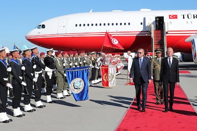 The Turkish foreign and defence ministers, as well as the country’s intelligence chief accompanied Mr Erdogan to Tunis. AP Photo