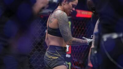Amanda Nunes reacts following her loss by submission against Julianna Pena at UFC 269. Reuters