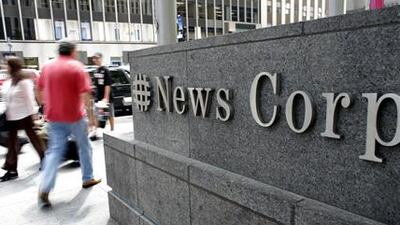 News Corp logo hanging outside their New York headquarters.