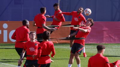 Atletico players during training ahead of the Champions League game with AC Milan. EPA