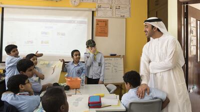 Sheikh Abdullah bin Zayed, Minister of Foreign Affairs and International Cooperation, speaks to pupils during a visit to the Bateen School for Boys. Wam