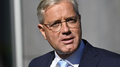 Norbert Roettgen arrives for a meeting with the outgoing leader of the party and other candidates. AFP