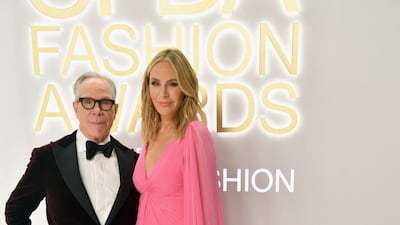 Fashion designer Tommy Hilfiger and Dee Ocleppo.