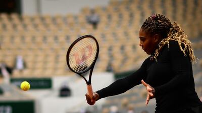 Serena Williams returns the ball to Kristie Ahn during their women's singles first round tennis match at the Philippe Chatrier court on Day 2 of The Roland Garros 2020 French Open tennis tournament. AFP