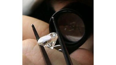 ABU DHABI - 20FEB2011 - Nico D'Haemer, Managing Director of International Gemological Institute shows diamond testing at the Diamond lab at Jumeriah Lakes in Dubai. Ravindranath K / The National