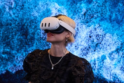 A visitor explores a VR work at Art Dubai Digital. Photo: Art Dubai