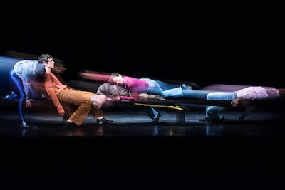 Five dancers perform around the six-metre bench in Maria Hassabi’s Us. Photo: Karol Jarek