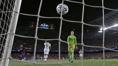 Bayern Munich keeper Manuel Neuer watches the ball go into the net as Barcelona's Neymar scores their third goal on Wednesday in their Champions League contest. Paul Hanna / Rueters