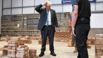 Mr. Johnson, seen here at Exeter College, apologised today after getting the detail wrong on his own coronavirus restrictions. AFP