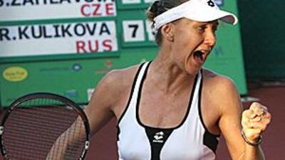 Regina Kulikova celebrates her victory over Sandra Zahlavova last night to clinch the Al Habtoor Tennis Challenge title.