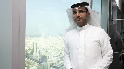 Hisham Alrayes, the chief executive of Gulf Finance House, will have reduced its share capital twice in six months. Razan Alzayani / The National