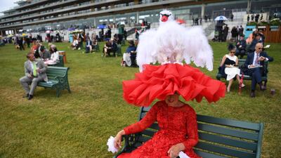 A woman in a decorative hat on day three of Royal Ascot, in Ascot, Britain. EPA