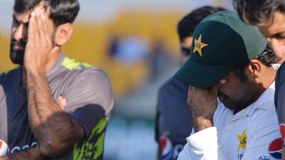 Pakistan captain Sarfraz Ahmed, right, and teammates after losing the Test series to New Zealand. AFP