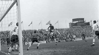 Manchester City's Colin Bell attempts a header on goal but his effort is saved by Fulham goalkeeper Ian Seymour, 1967. Reuters