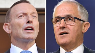 Australian Prime Minister Tony Abbott, left, has been ousted as leader of the Liberal Party by communications minister Malcolm Turnbull, right. Greg Wood, Mark Graham/AP Photo
