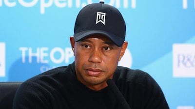 Tiger Woods answers questions from the media during a practice round prior to the start of the British Open Championship at Royal Liverpool on July 15, 2014 in Hoylake, England. Matthew Lewis/Getty Images
