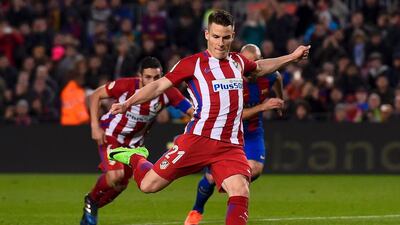 Atletico Madrid forward Kevin Gameiro executes a penalty kick – and misses. Josep Lago / AFP