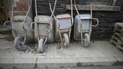 Wheelbarrows are another argument for wheels. AFP